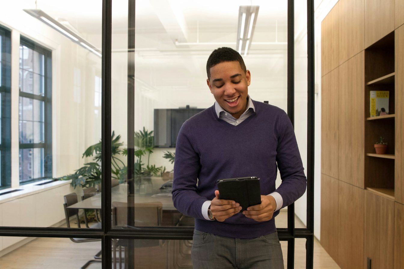 An IT manager reviewing Microsoft licence usage on a tablet